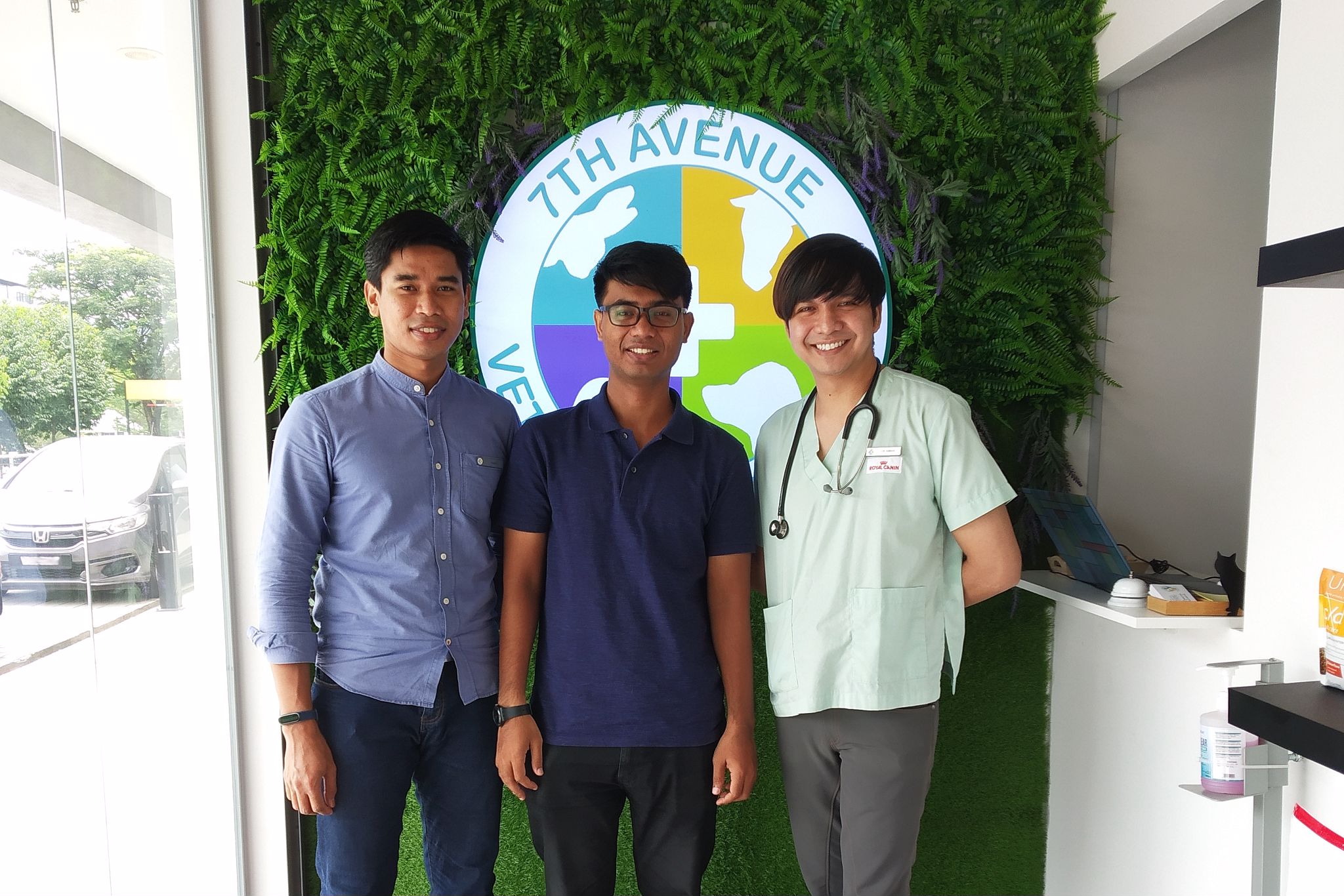Dr. Aiman and team posing in front of the clinic