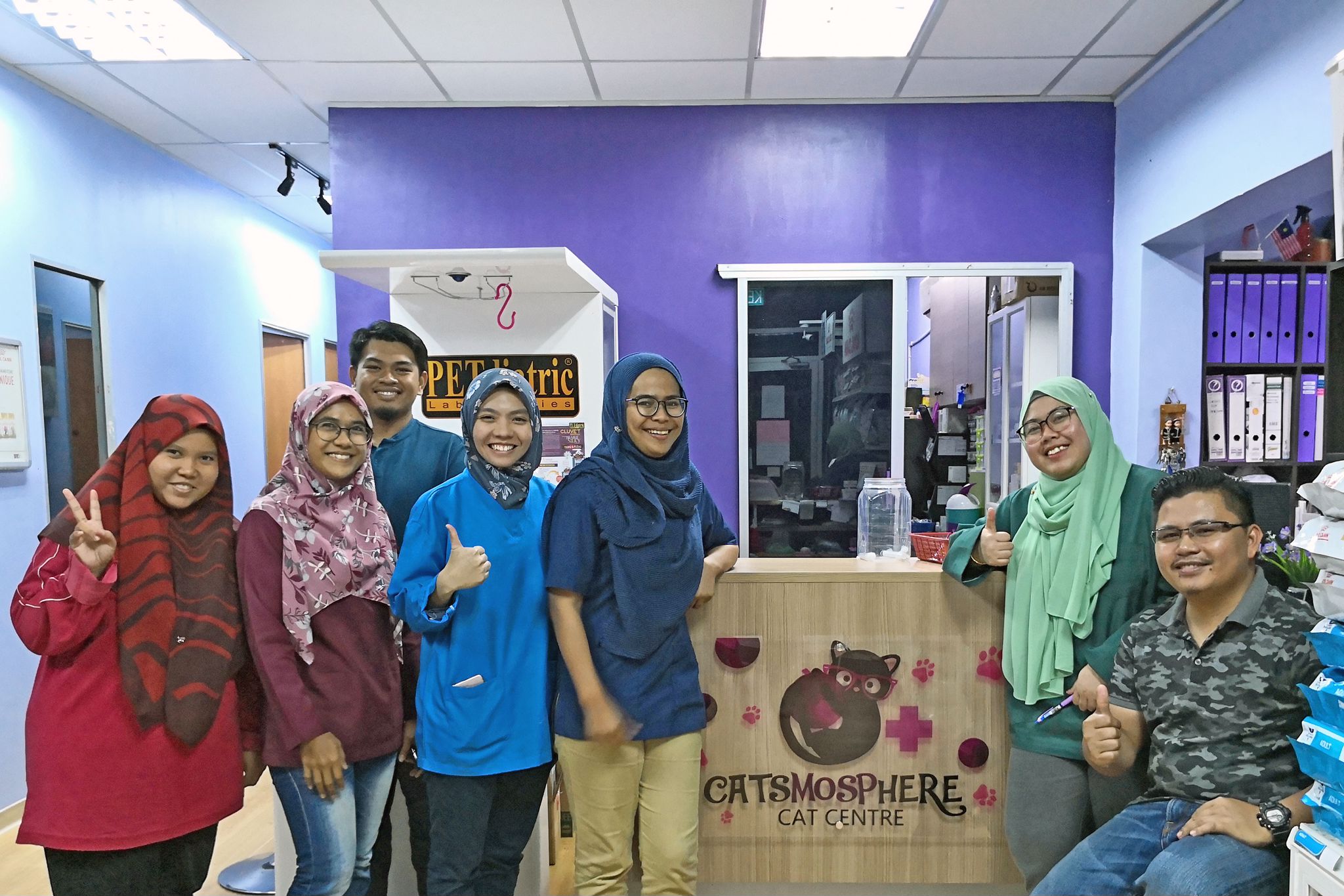 A photo of the friendly and dedicated team taken at Catmosphere Cat Centre.