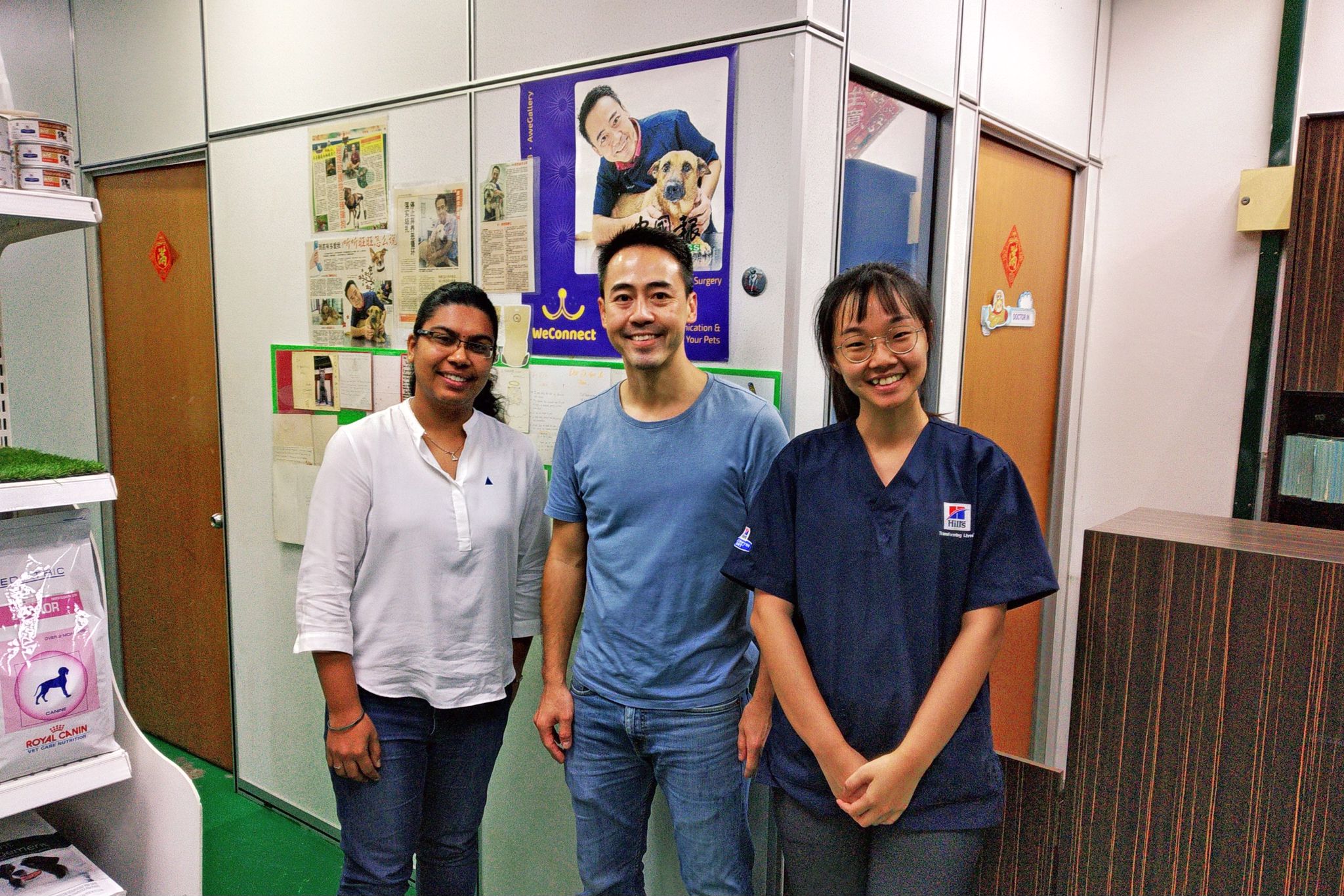 A photo of Shivam, Dr. Goh and his assistant at the clinic.