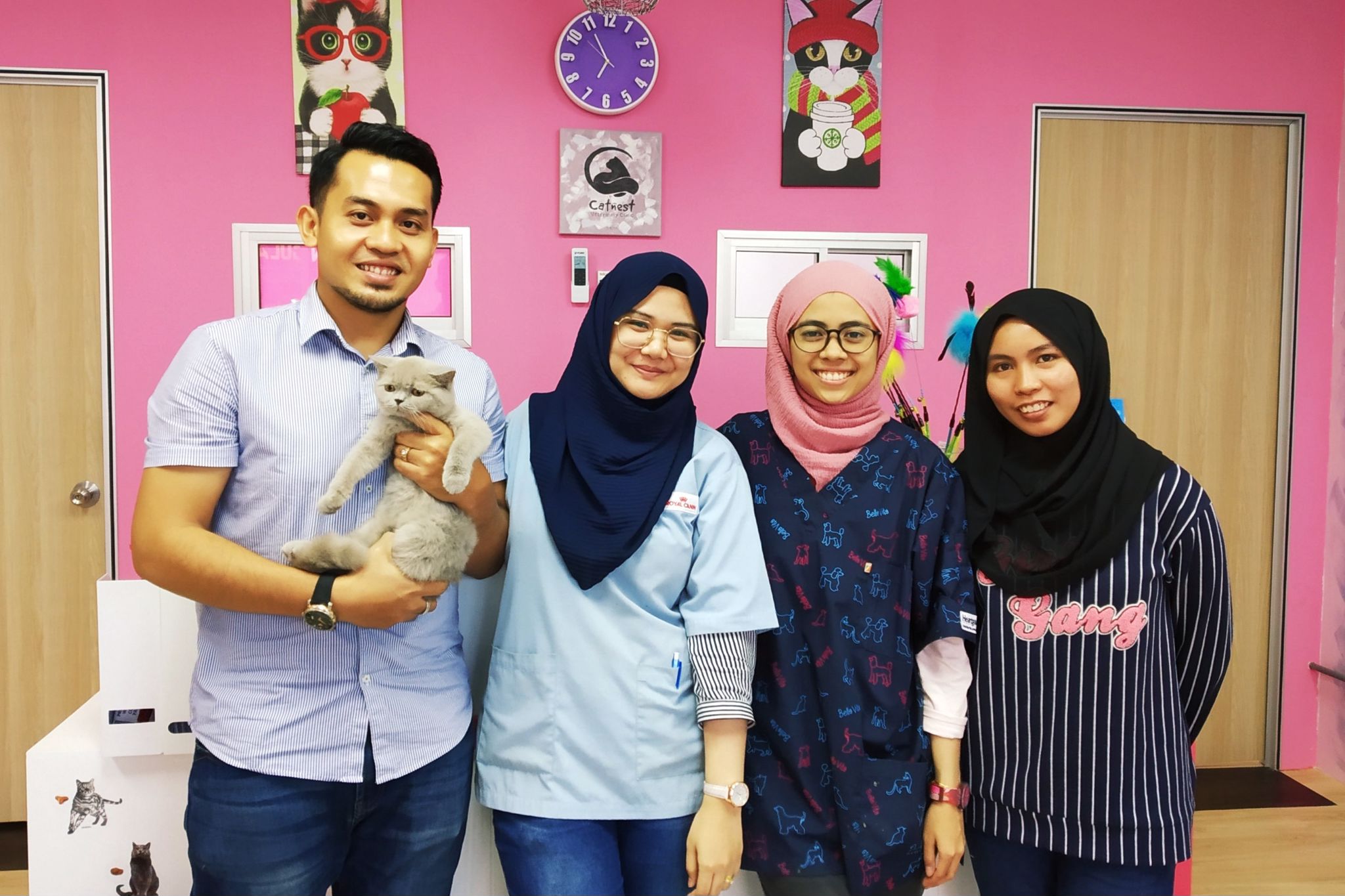 Dr. Razila and her team posing for a photo at the clinic