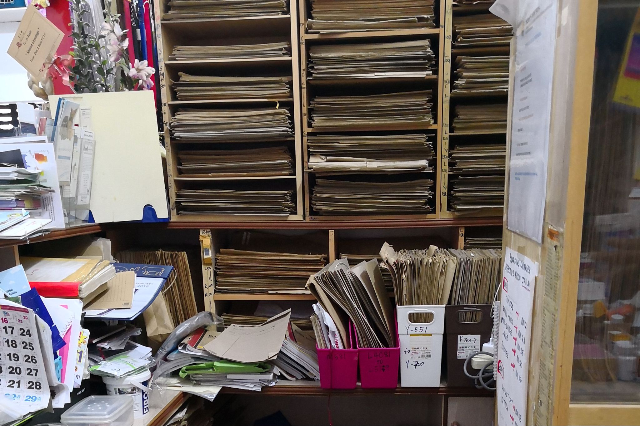 These are the shelves and table of a typical receptionist, stuffed with endless documentation and customer records which can be overwhelming at times. If all the document are transformed into soft copies, then more space will be saved and records will be easier to find.