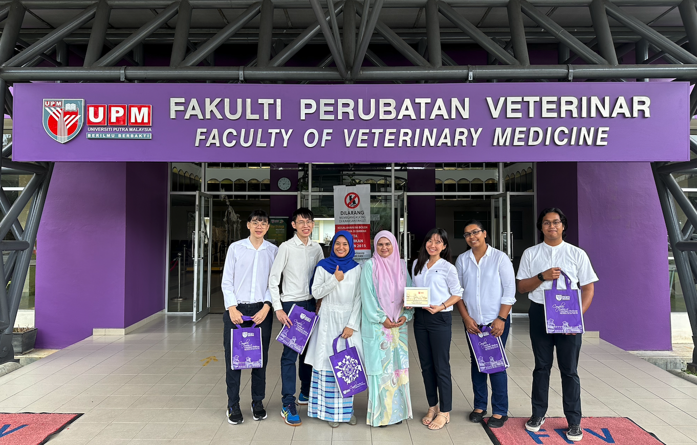The Kreloses team, together with Dr. Norhariani Mohd Nor, proudly stands outside the Faculty of Veterinary Medicine at UPM after a successful hands-on training session with the VPP3171 class.